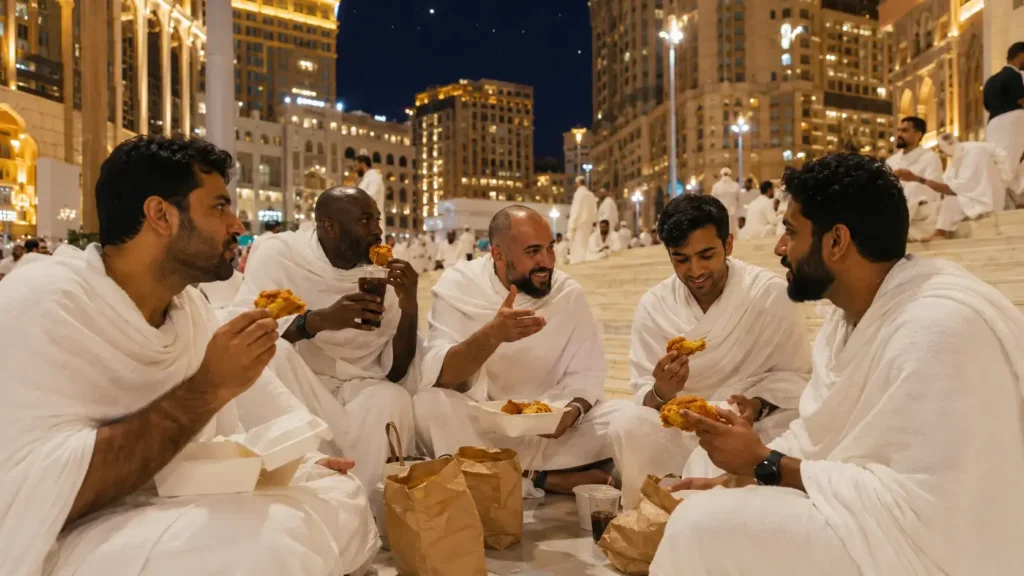 albaik-pilgrims-food-pilgrims-sharing-meal-makkah